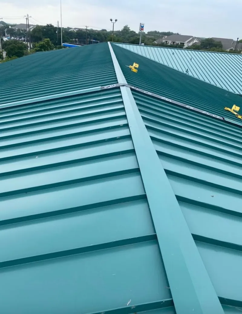 Green commercial metal roof ridge and valley for Metal Roof Repair in Schriever